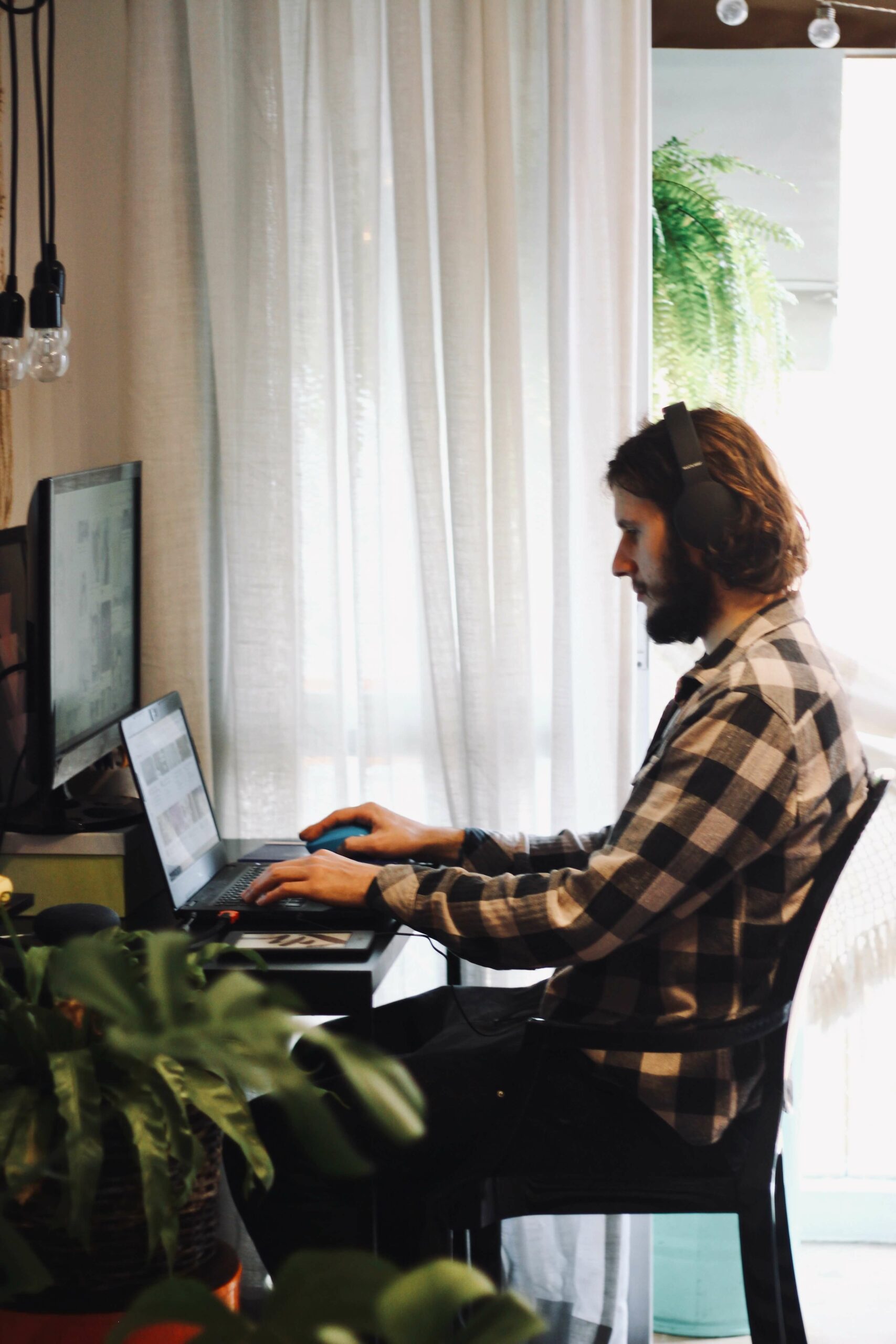 man working in his home