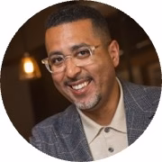 Image of a professional man with glasses.
